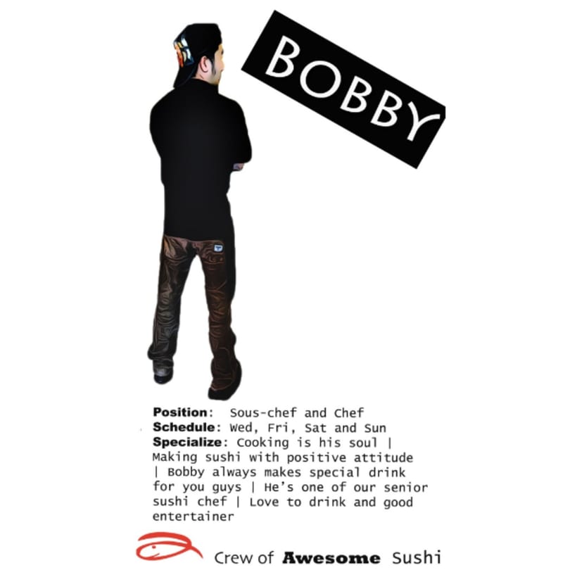 Bobby, a chef from Awesome Sushi, stands with his back to the viewer, wearing a black shirt and cap.